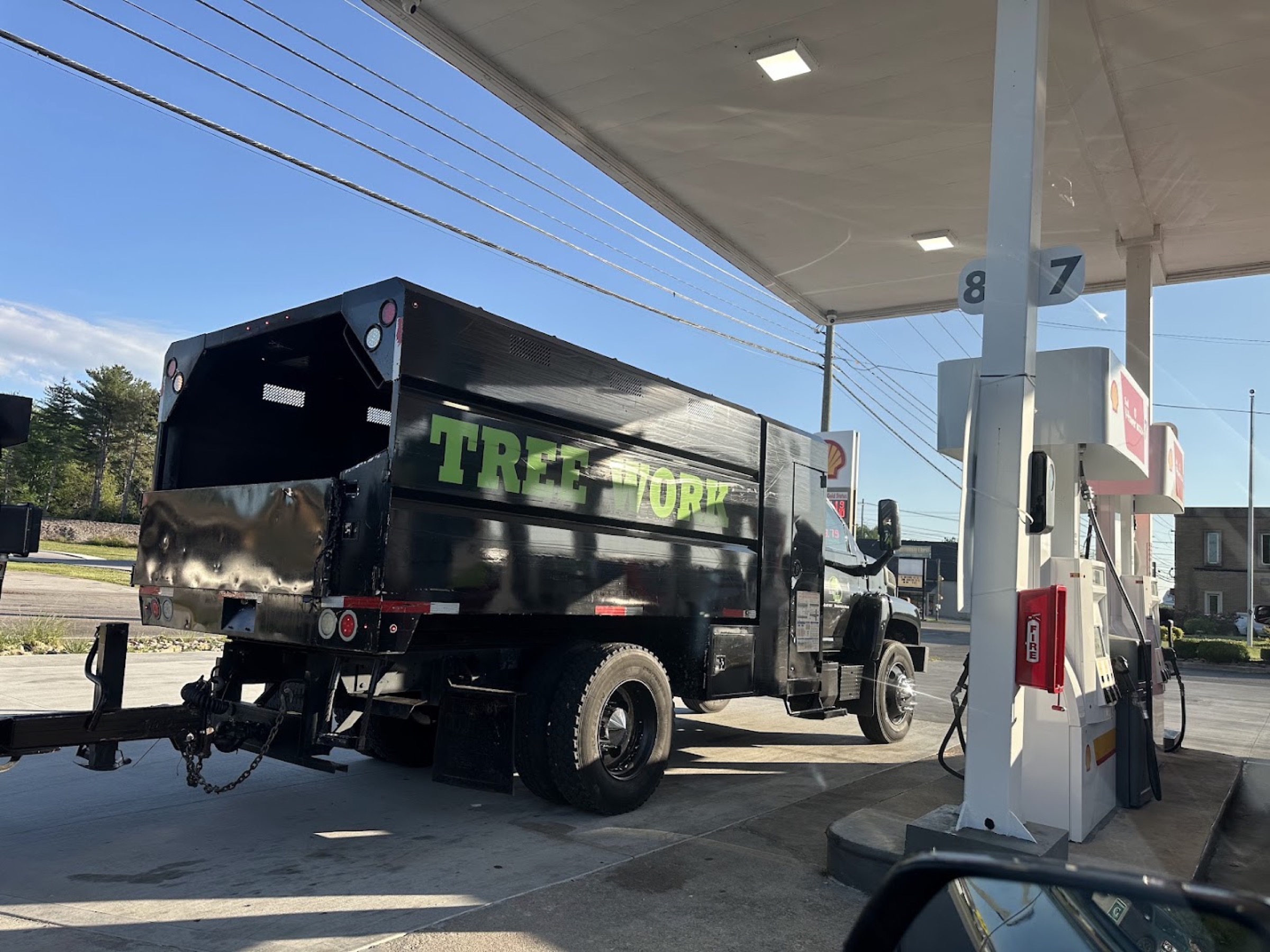 The Elite Tree Service truck and equipment loaded and ready for a job